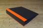 Preview: black folder with orange linen edges